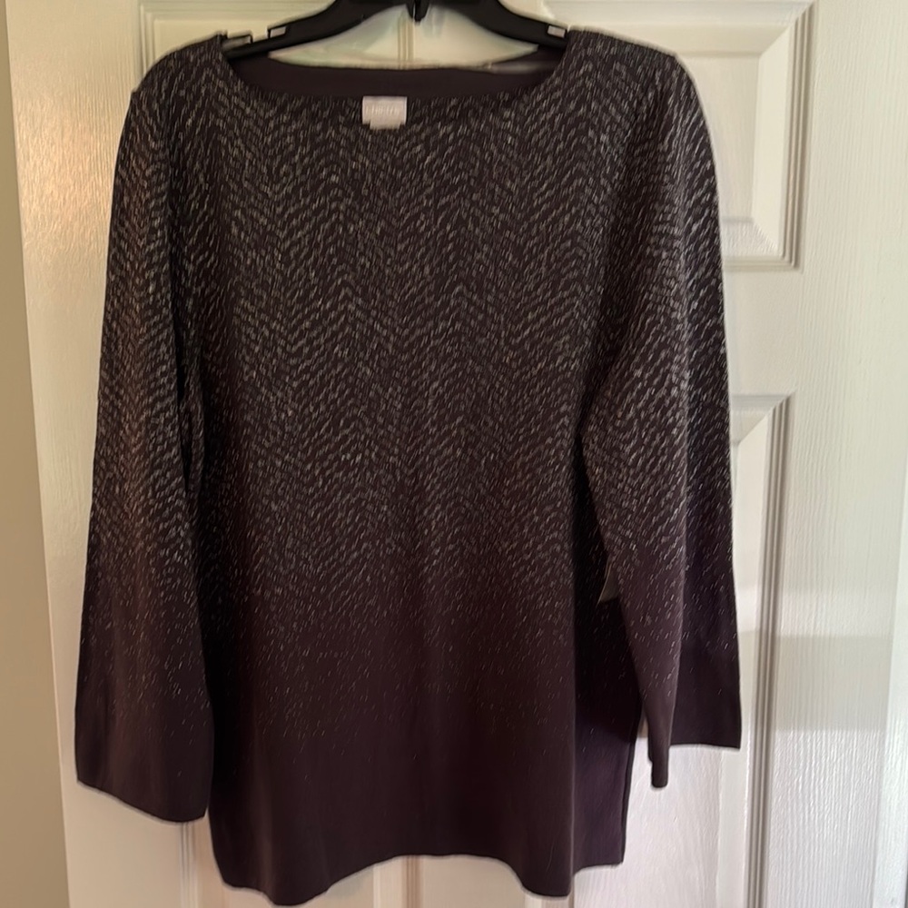 NWT
Chico’s Black sweater with silver sparkle
Size 2